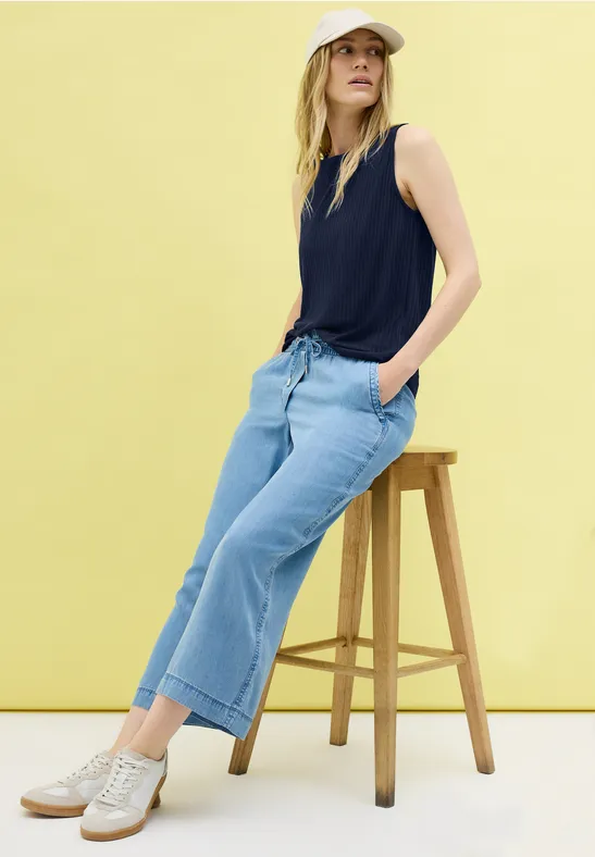 Top met geribbelde structuur