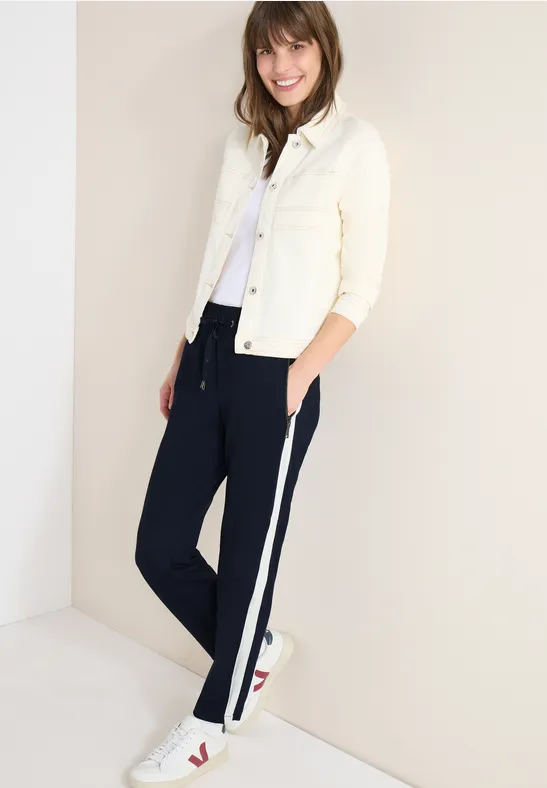 Broek met colour block tape