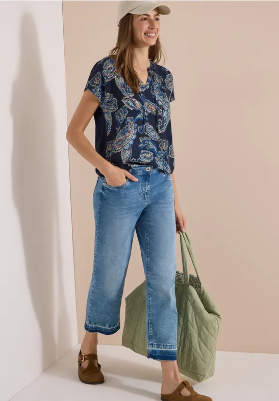 Blouse met split in de hals en een mix van texturen