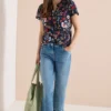 Shirt met gespleten hals en knoopdetails