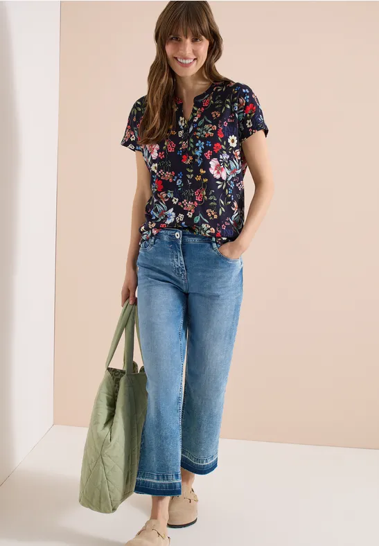 Shirt met gespleten hals en knoopdetails