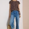Blouse met afhangende schouders en knoop